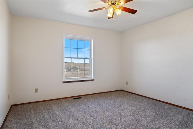 unfurnished room with carpet floors and ceiling fan