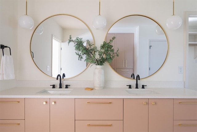 bathroom with double vanity and a sink