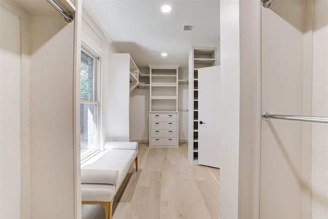 walk in closet featuring visible vents and light wood-style flooring