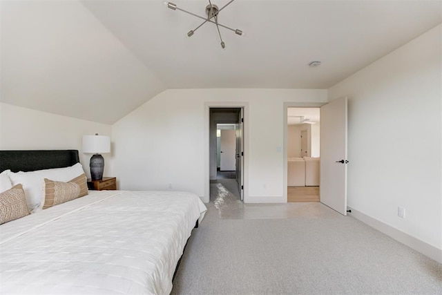 bedroom featuring baseboards and lofted ceiling