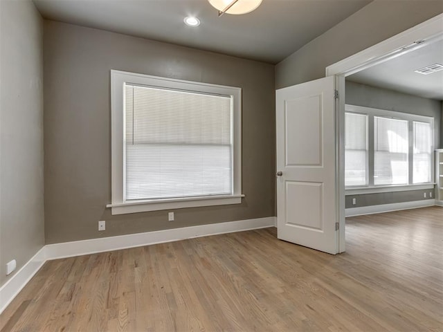 empty room featuring light hardwood / wood-style floors