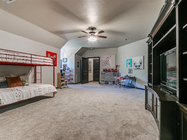 carpeted bedroom featuring ceiling fan and lofted ceiling