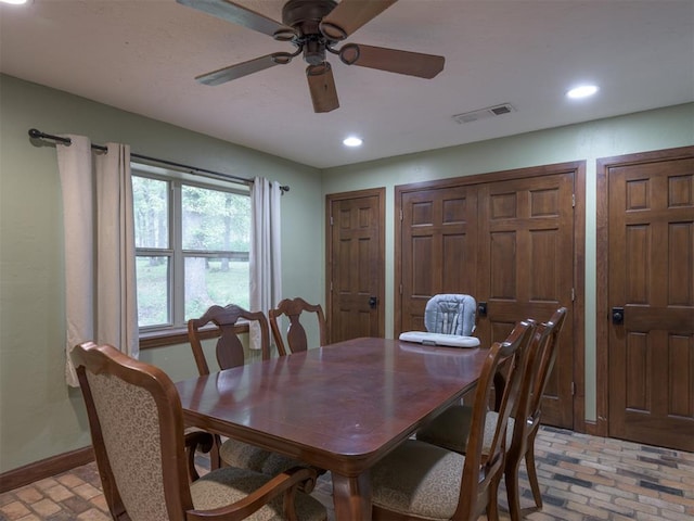 dining area with ceiling fan