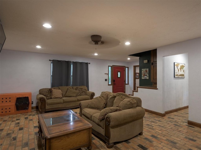 living room with ceiling fan