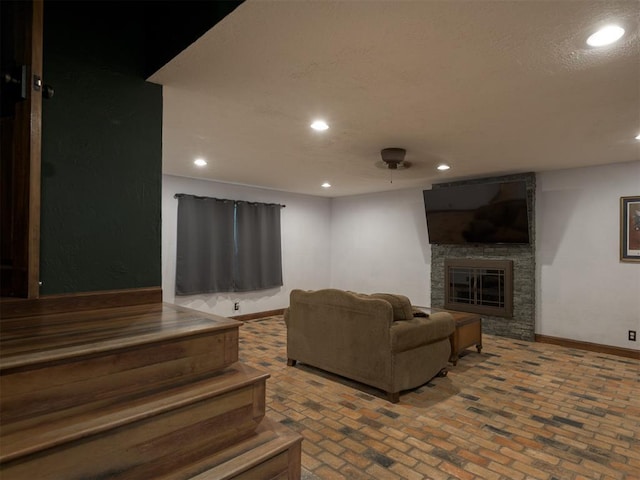 living room featuring a fireplace