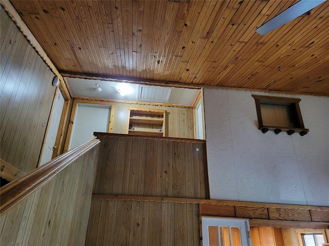 additional living space with wooden ceiling