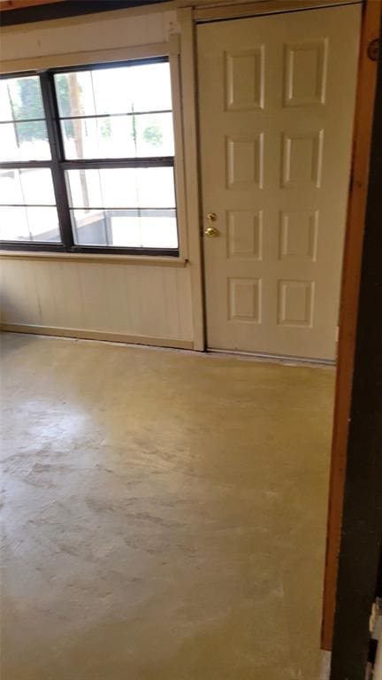 foyer featuring concrete flooring