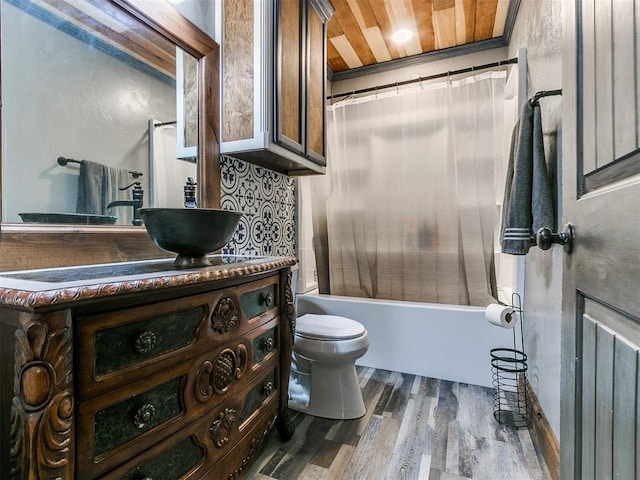 full bathroom with hardwood / wood-style floors, shower / bath combination with curtain, toilet, vanity, and wood ceiling