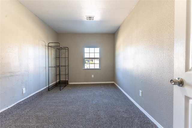 spare room with carpet