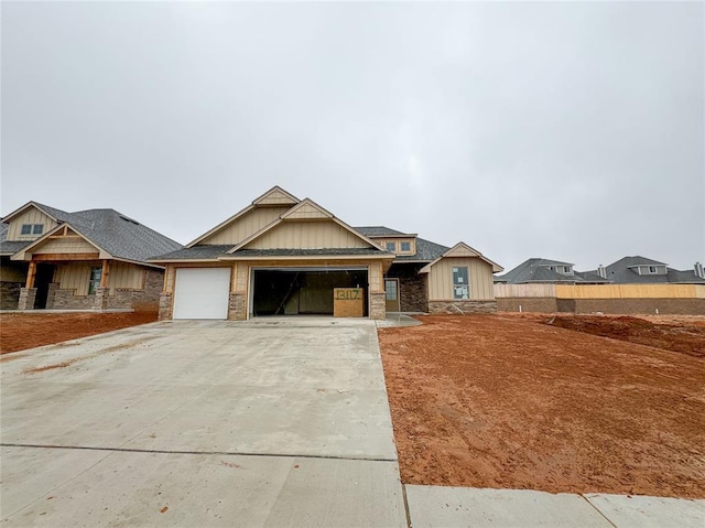 craftsman house with a garage