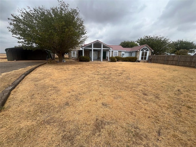 exterior space featuring a carport