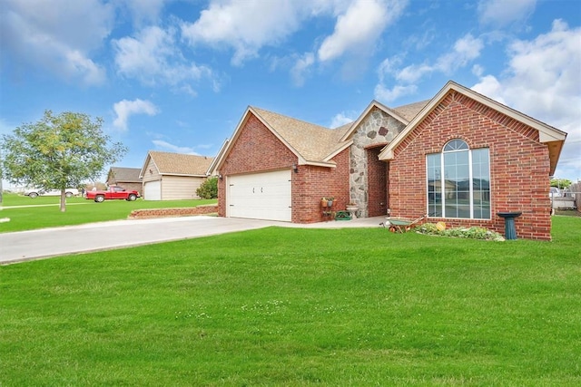 view of front facade featuring a garage and a front lawn