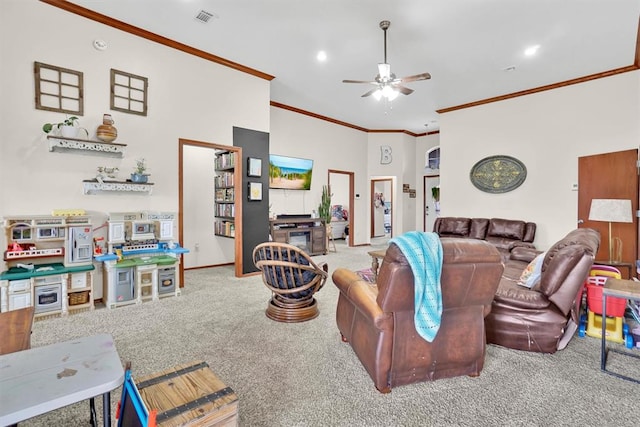 living room featuring ceiling fan, light colored carpet, and ornamental molding