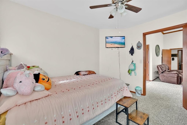 bedroom featuring ceiling fan and carpet floors