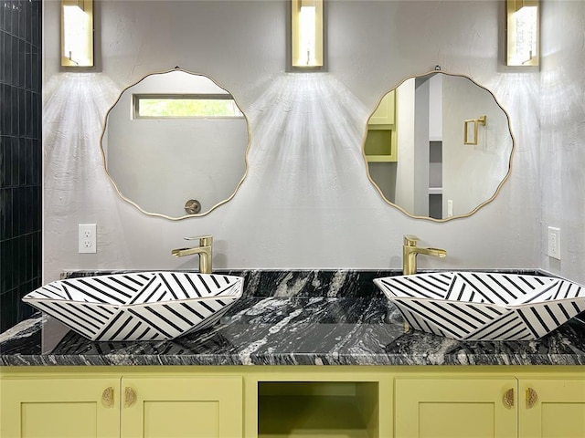 bathroom featuring sink and a wealth of natural light