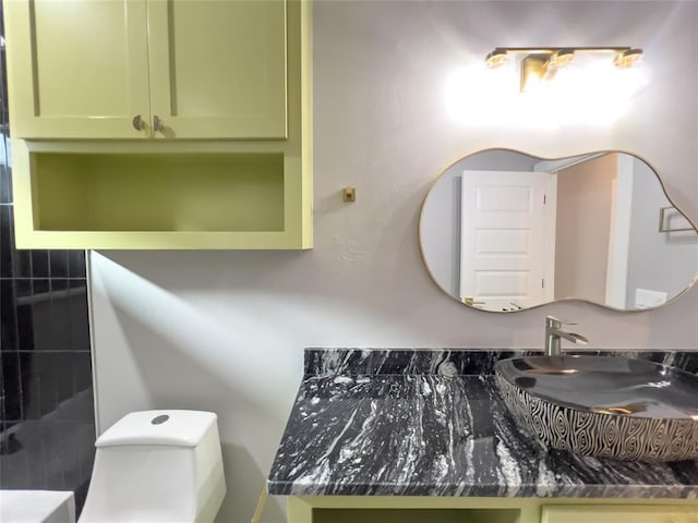 bathroom with sink and toilet