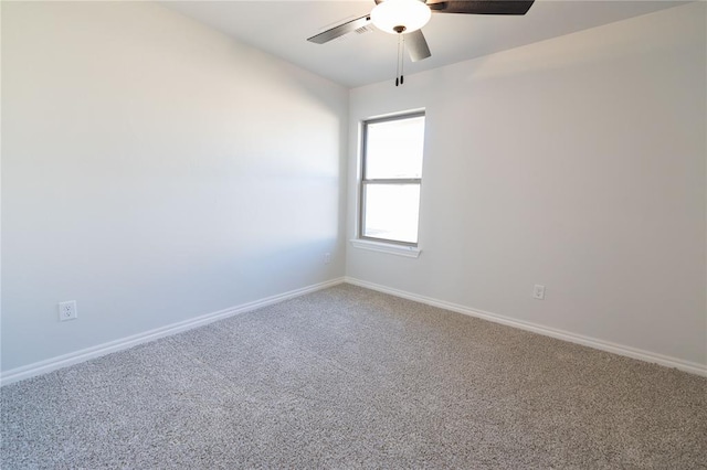 unfurnished room with carpet and ceiling fan