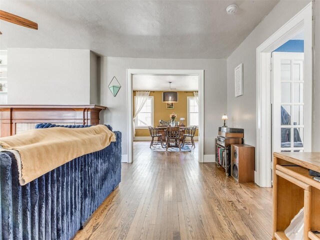 2045 NW 21st St, Oklahoma City, OK 73106 - living room featuring light wood-type flooring and baseboards
