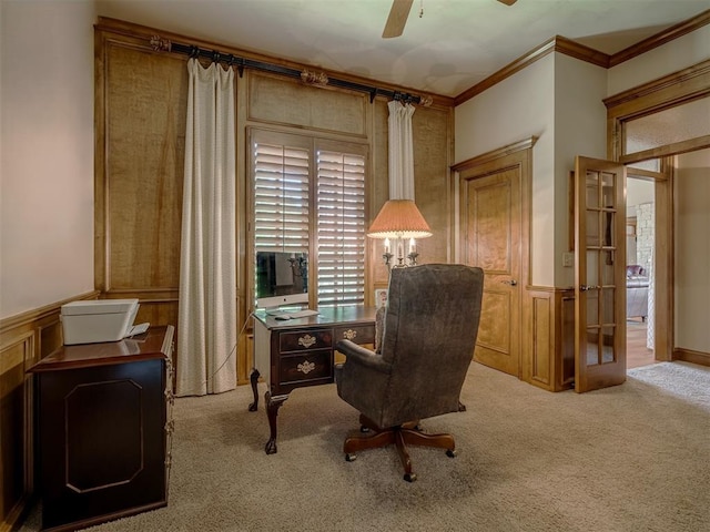 office with ceiling fan, french doors, light colored carpet, and ornamental molding