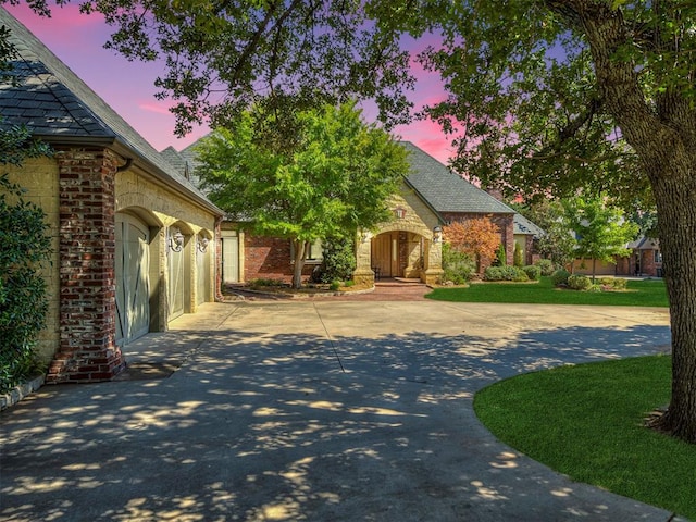 view of front of property with a garage