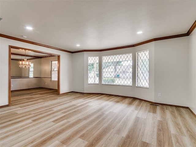 unfurnished living room featuring a chandelier, light hardwood / wood-style flooring, and crown molding