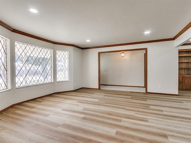 4997 NW 30th Pl, Oklahoma City, OK 73122 - empty room featuring ornamental molding, light wood-style flooring, baseboards, and recessed lighting