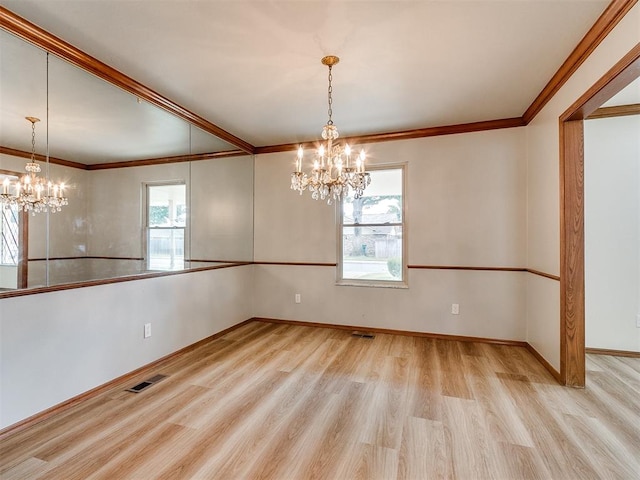 unfurnished dining area featuring light hardwood / wood-style floors, crown molding, and a wealth of natural light