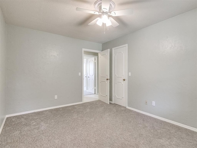 4997 NW 30th Pl, Oklahoma City, OK 73122 - empty room with carpet floors, ceiling fan, and baseboards