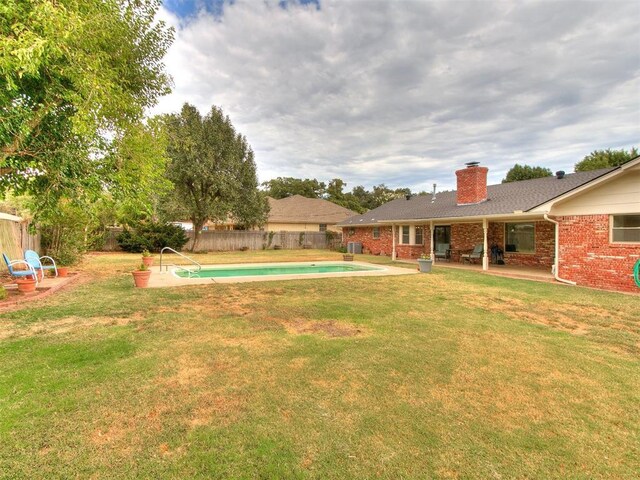 4997 NW 30th Pl, Oklahoma City, OK 73122 - view of yard with a patio area