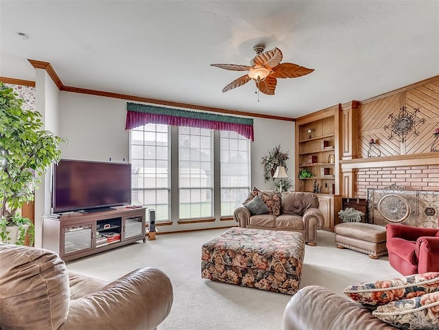 living room with light carpet, a brick fireplace, ceiling fan, and crown molding