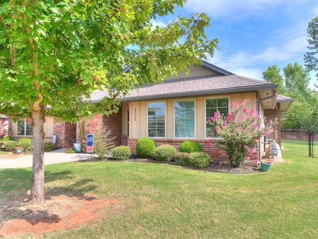 view of front of home with a front lawn