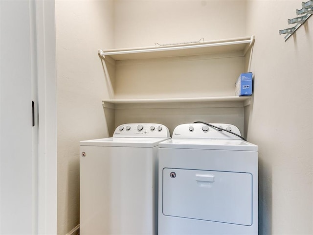 laundry area featuring separate washer and dryer