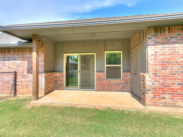 doorway to property featuring a patio