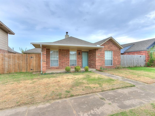 single story home with a front yard