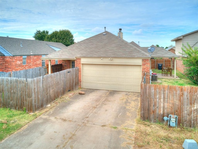 view of front of home with a garage