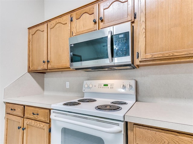 kitchen with white electric range oven