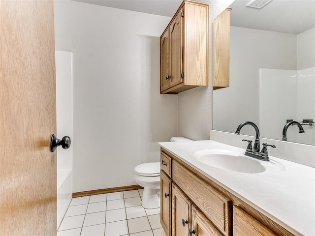 full bathroom featuring tile patterned floors, vanity, toilet, and bathtub / shower combination