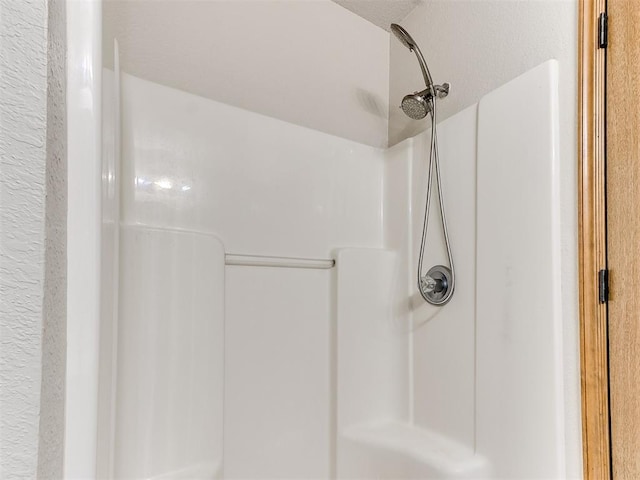 bathroom featuring a shower