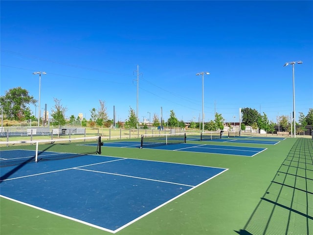 view of sport court with basketball hoop