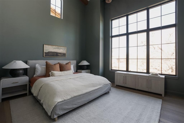 bedroom with light hardwood / wood-style floors