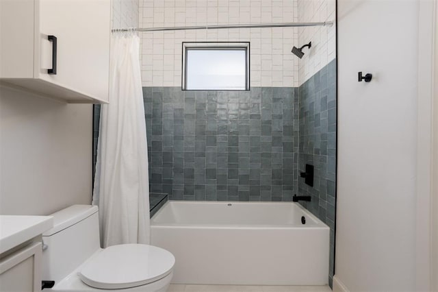 full bathroom with toilet, vanity, and shower / tub combo