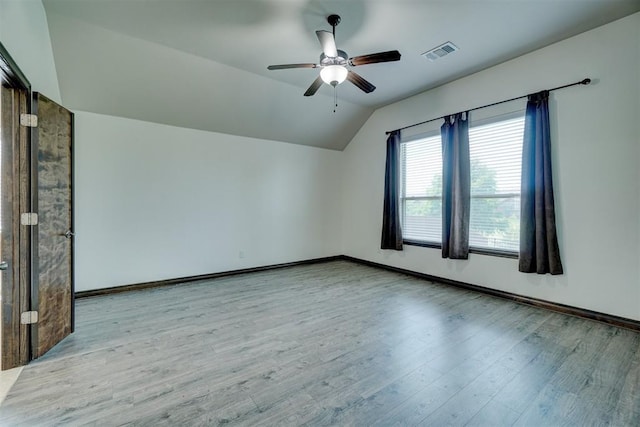 bonus room with light hardwood / wood-style flooring, ceiling fan, and lofted ceiling