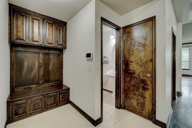 mudroom featuring light tile patterned floors