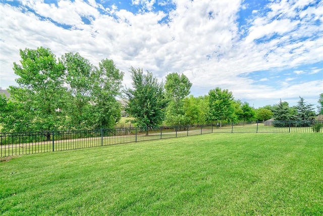 view of yard with a rural view