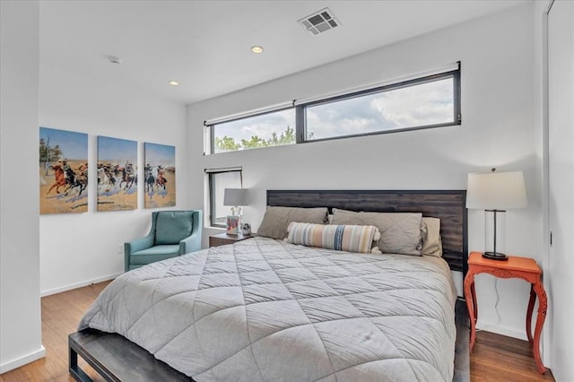 bedroom with wood-type flooring