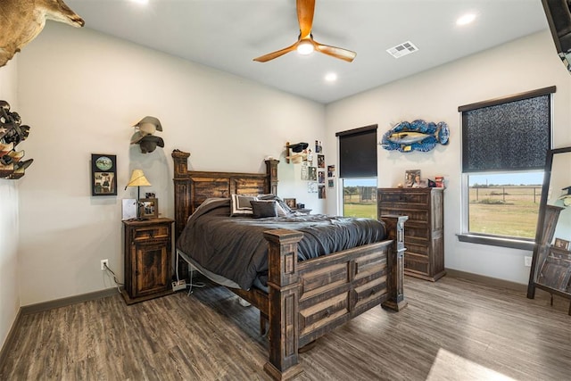 bedroom featuring ceiling fan and wood-type flooring