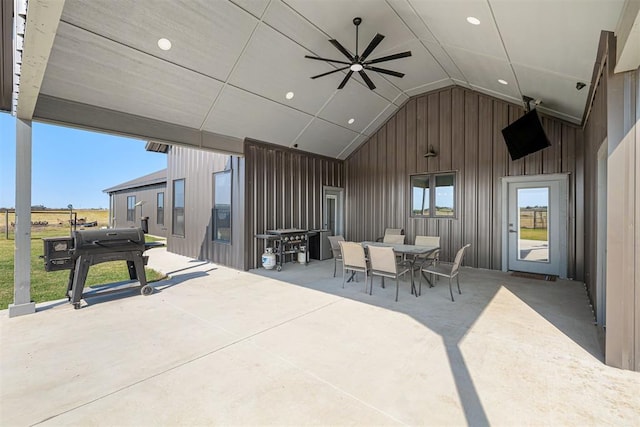 view of patio / terrace with area for grilling and ceiling fan