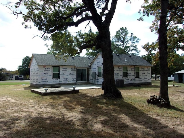 33322 Hardesty Rd, Shawnee, OK 74801 - rear view of property featuring a lawn and a patio area
