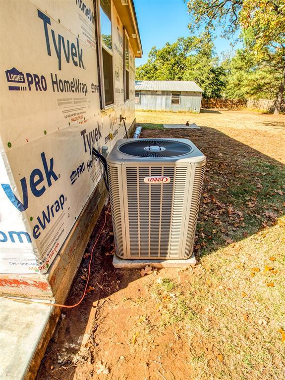 33322 Hardesty Rd, Shawnee, OK 74801 - exterior view of a central air condition unit