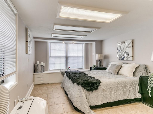 bedroom featuring light tile patterned floors